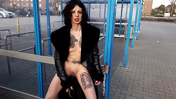 Slut Lucy pleasure her pussy with a pylon and a vibrator in a public park